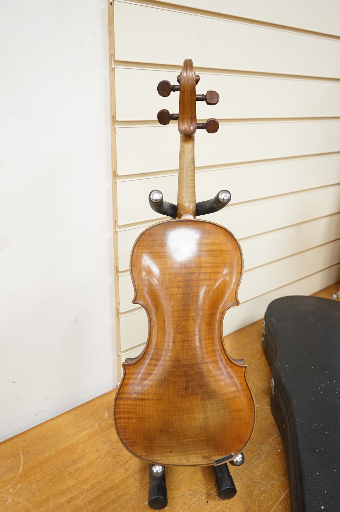 A late 18th century cased English violin, possibly after Richard Duke, length of body 35.5cm.